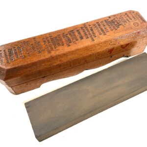 Oak wooden boxed sharpening stone. (42528)